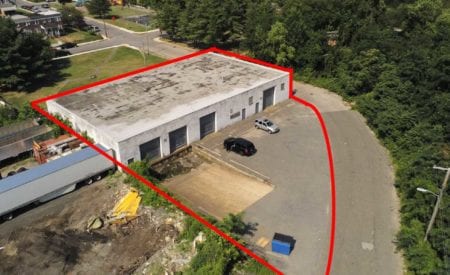Aerial view of warehouse property showing property bounds