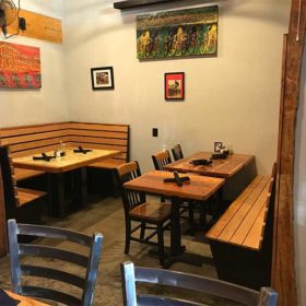 Wooden tables and bench seating